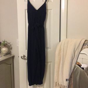 Navy jumpsuit. Synched waistband jogger type legs